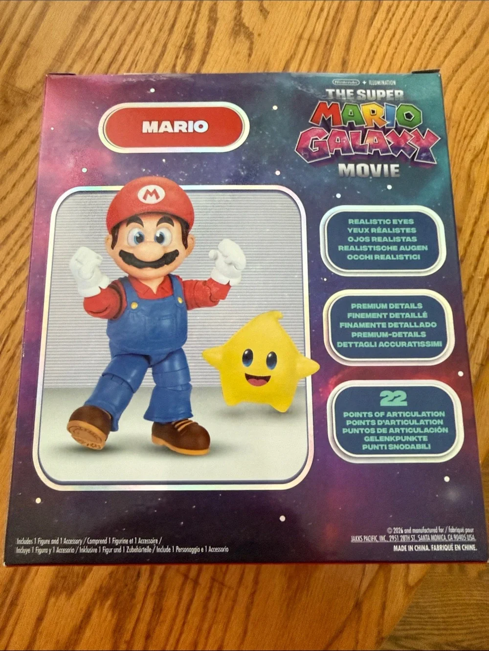 Nintendo Mario Figure with Red Hat, Blue Overalls and Yellow Luma